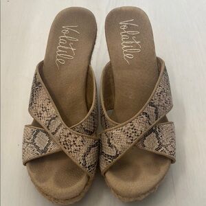 Like new volatile snake skin wedges, size 8